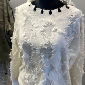 White distressed sweater